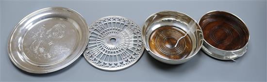 Two silver bottle coasters, a silver Last Farewell to the British Empire commemorative plate and a silver-mounted glass plate stand